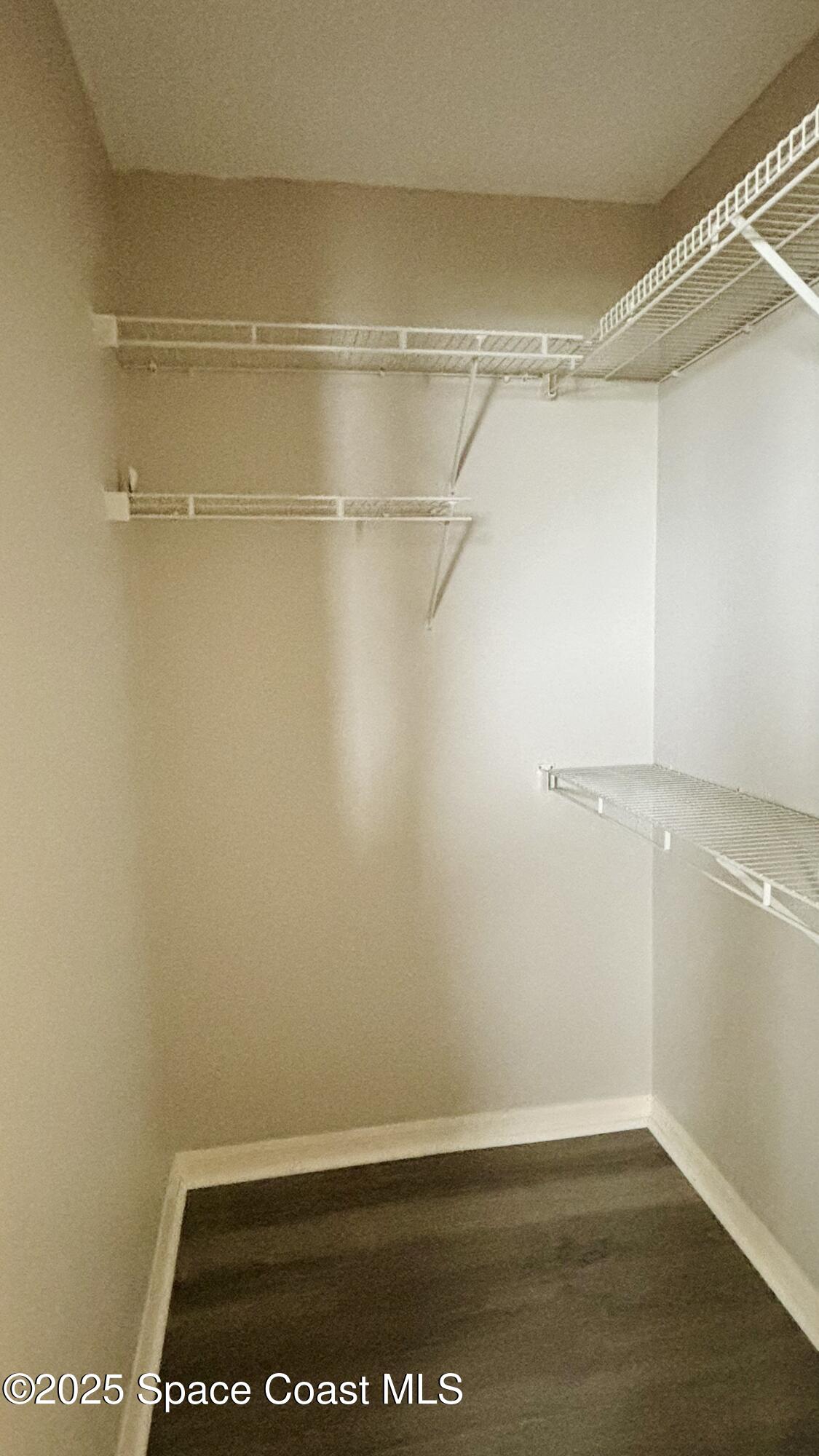 5508 Ambersand Place Grant-Valkaria, FL 32949 - Photo 9 of 30 a view of a room with an empty walk in closet