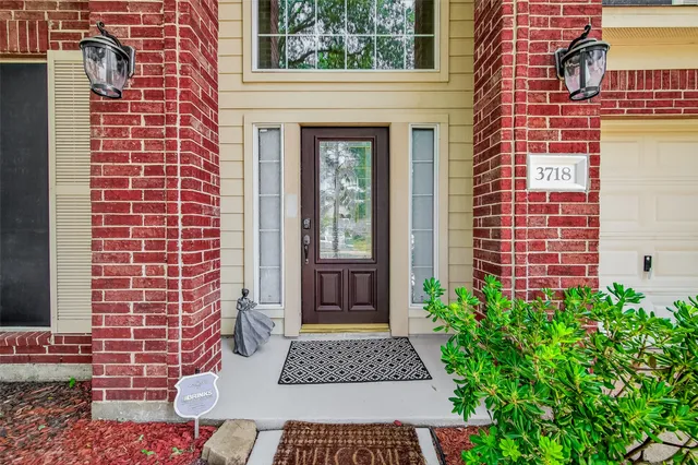 a view of a brick building with many windows
