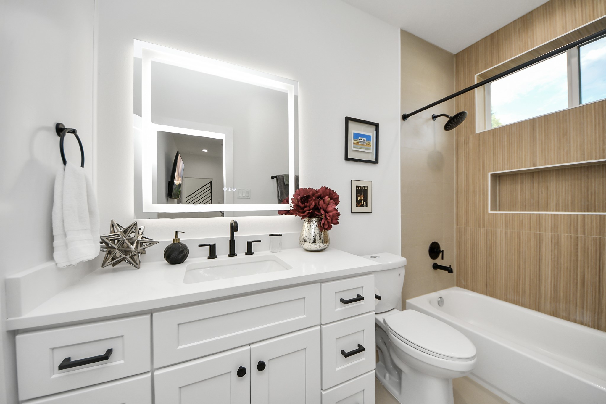 1044 West 17th Street Houston, TX 77008 - Photo 8 of 48 a bathroom with a sink a toilet and shower
