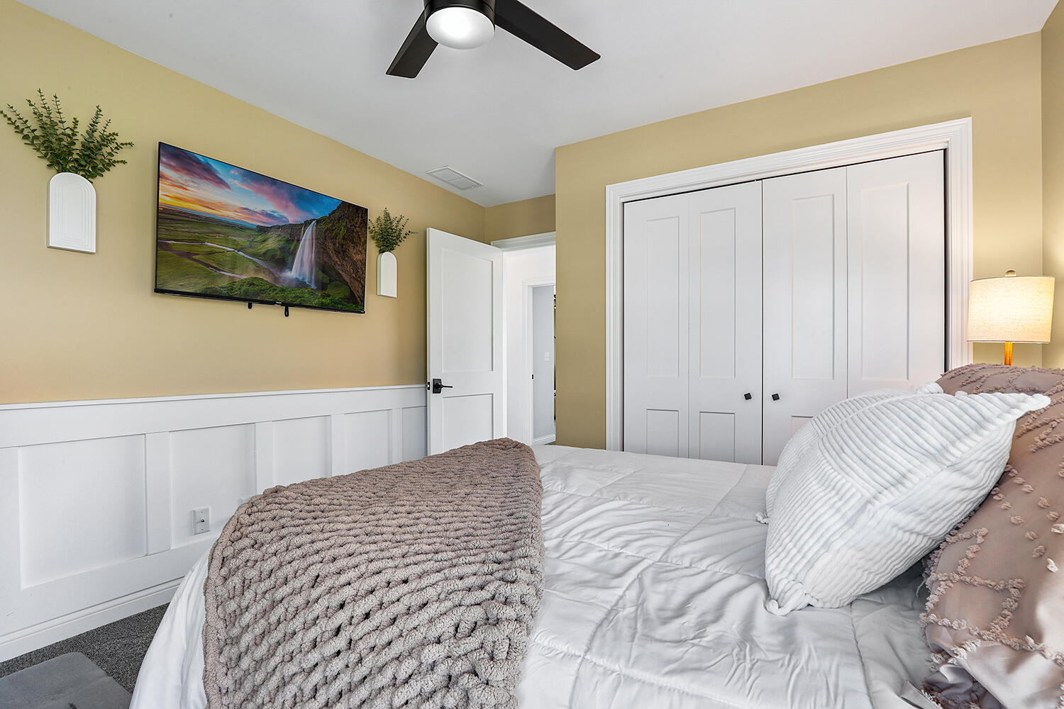 17152 High Point Court Lowell, IN 46356 - Photo 27 of 54 a bedroom with a bed and a flat screen tv