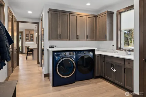 a en suite bathroom with a sink a mirror and a shower