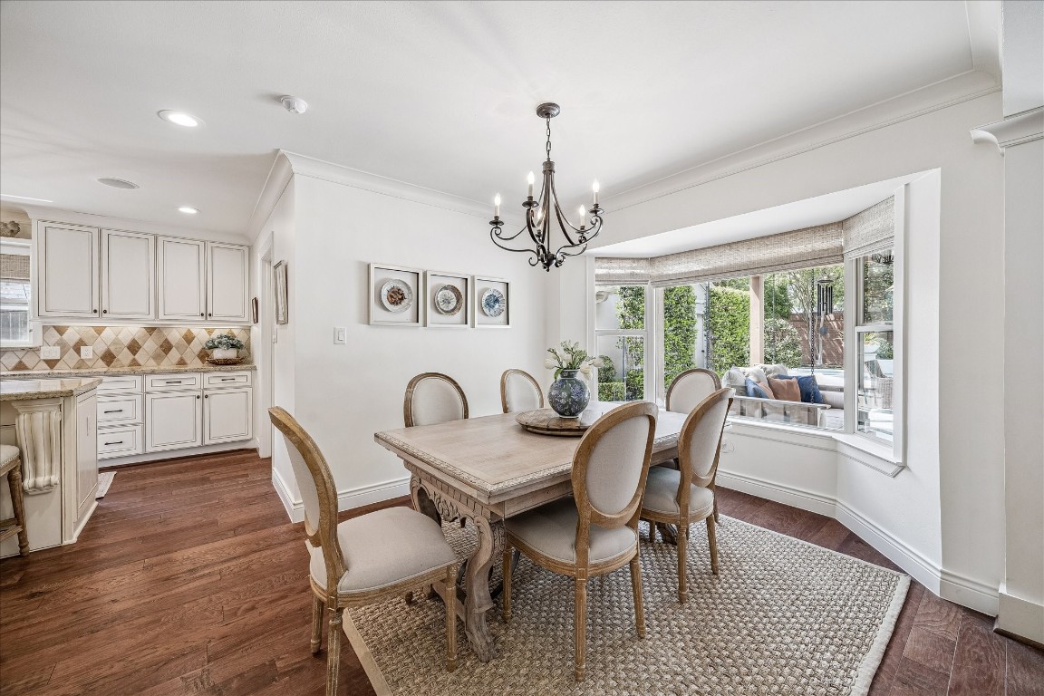 627 Ramblewood Road Houston, TX 77079 - Photo 14 of 48 Breakfast room has beautiful views to the incredible backyard and pool.