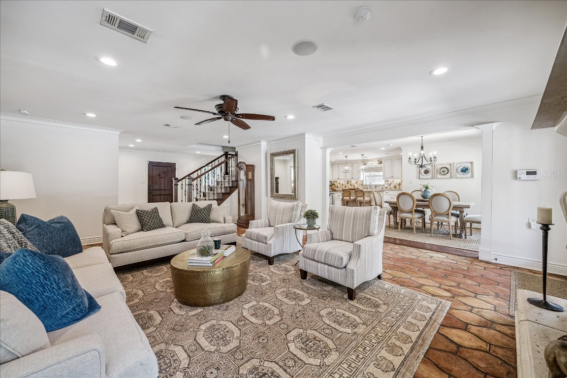 627 Ramblewood Road Houston, TX 77079 - Photo 3 of 48 Gorgeous family room open to breakfast/dining room perfect for entertaining or family living. Surround music, ceiling fan and neutral paint make this move in ready.