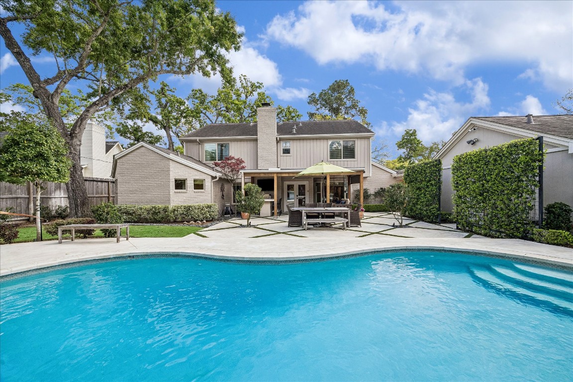 627 Ramblewood Road Houston, TX 77079 - Photo 37 of 48 Gorgeous pool with new tile and limestone coping in 2018.
