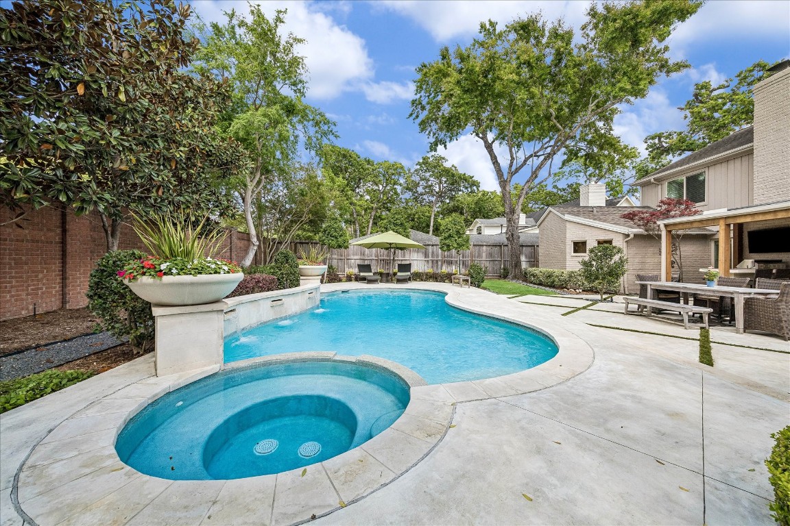 627 Ramblewood Road Houston, TX 77079 - Photo 39 of 48 Hot tub and waterfall complete this beautiful pool remodel.