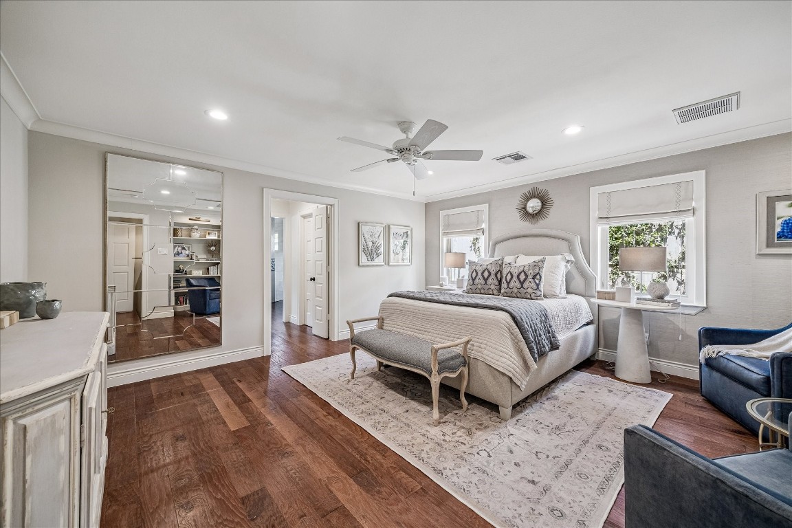 627 Ramblewood Road Houston, TX 77079 - Photo 5 of 48 Dreamy primary suite in back of home offers hardwood floors, builtins and area for a seating or a reading nook. Simply gorgeous.