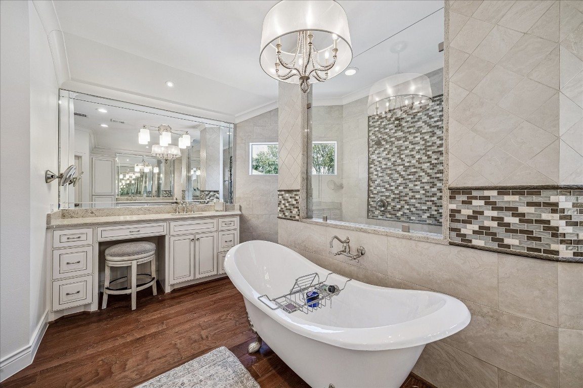 627 Ramblewood Road Houston, TX 77079 - Photo 6 of 48 Stunning primary bathroom with enormous walk in shower and separate soaking tub for the ultimate in relaxation. Very spacious with his/her sinks, beautiful lighting, and private water closet.