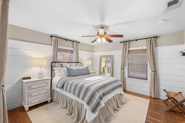 a bedroom with a bed and a walk in closet