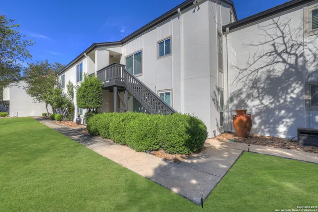 a view of a back yard of the house