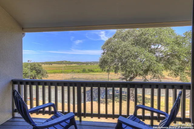 a view of a porch with a yard