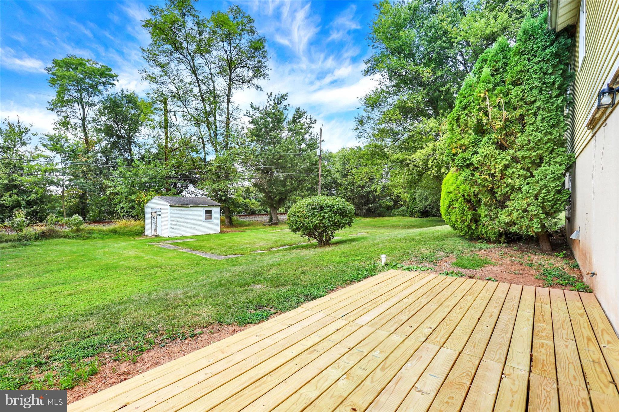 2441 River Road Middletown, PA 17057 - Photo 19 of 20 a view of a backyard with a garden