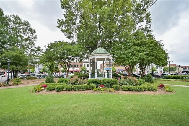 a park with lots of trees and plants