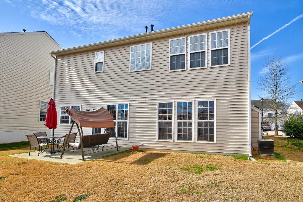 7754 San Gabriel Street Raleigh, NC 27613 - Photo 25 of 25 Long Lake Community also features a very large outdoor community pool, playground, and tennis courts! Fabulous place to live! Exterior Back