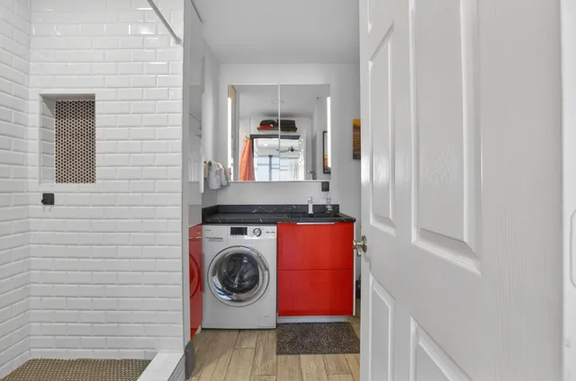 a utility room with dryer and washer