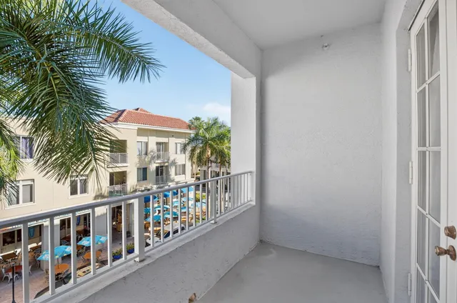 a view of balcony with small garden