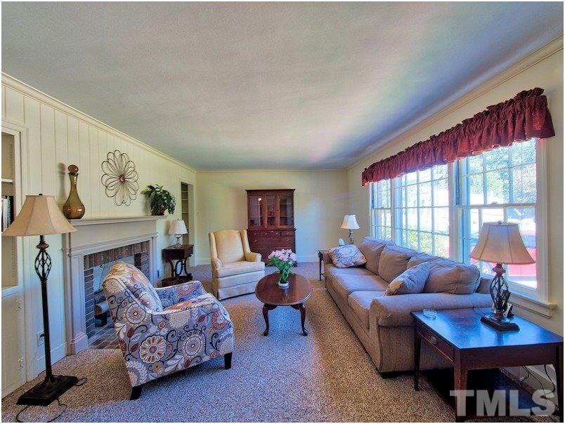 2703 Clark Avenue Raleigh, NC 27607 - Photo 3 of 24 a living room with furniture and a large window
