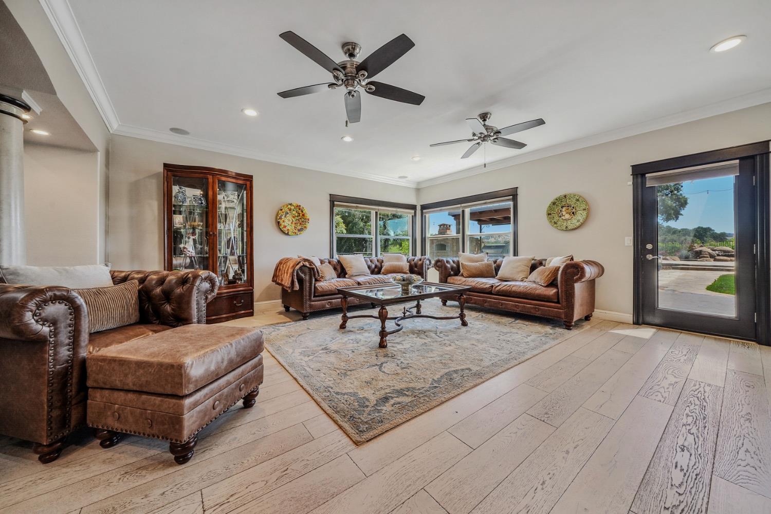 10786 Shenandoah Road Plymouth, CA 95669 - Photo 16 of 99 a living room with furniture and wooden floor