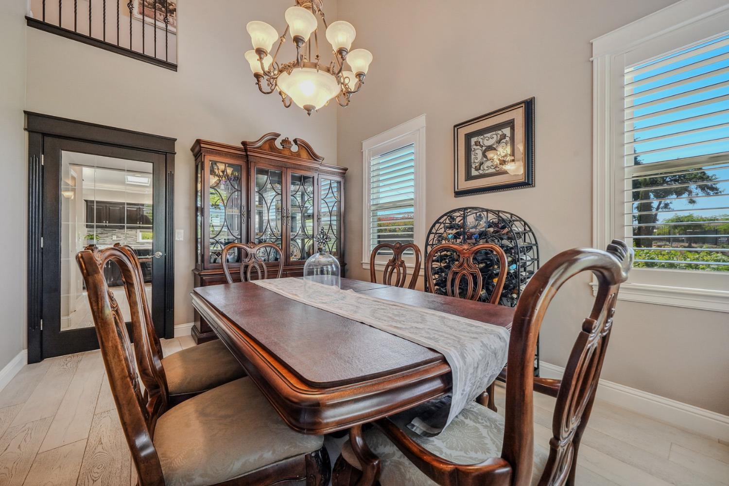 10786 Shenandoah Road Plymouth, CA 95669 - Photo 28 of 99 a view of a dining room with furniture window and wooden floor
