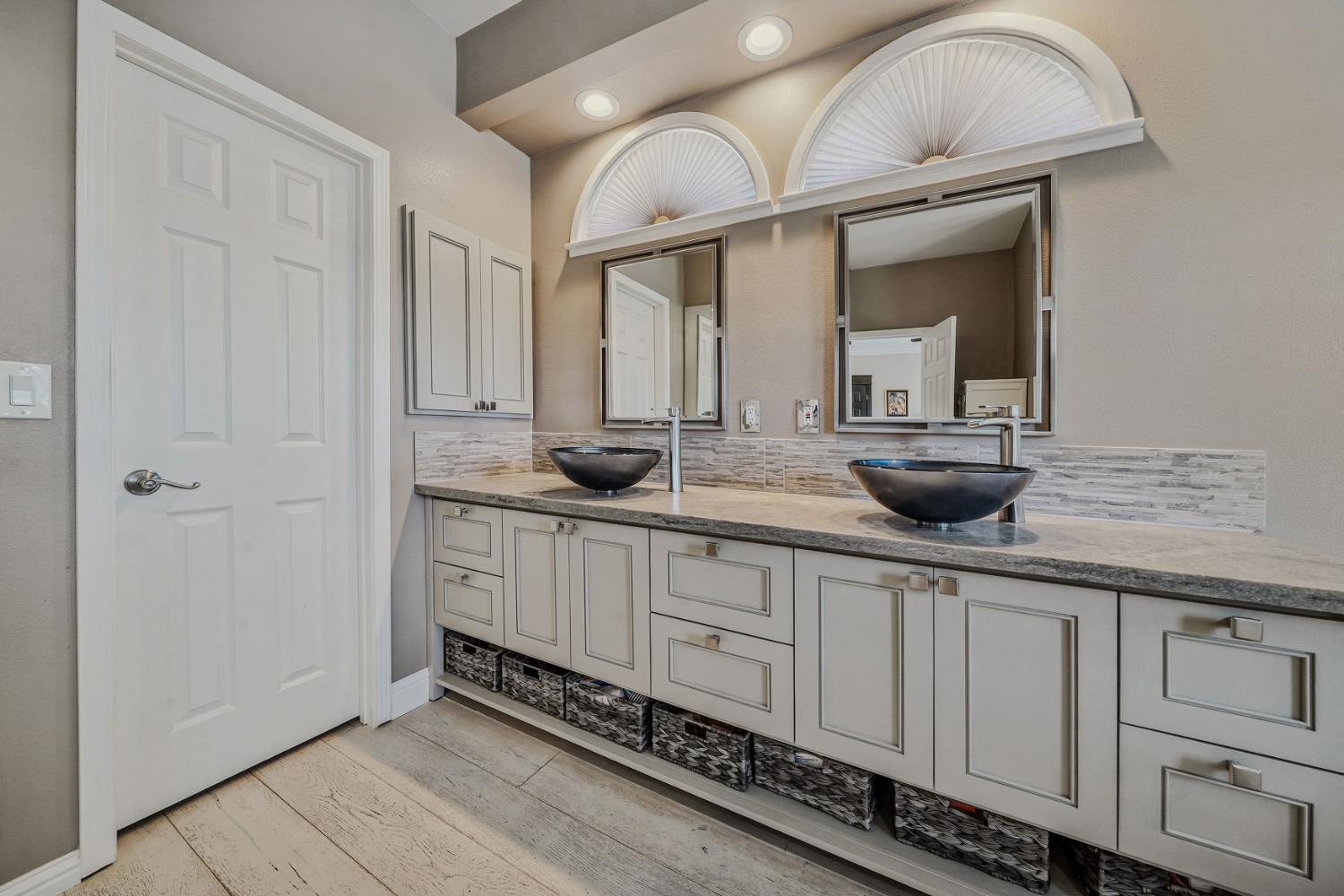 10786 Shenandoah Road Plymouth, CA 95669 - Photo 37 of 99 a kitchen with white cabinets and sink