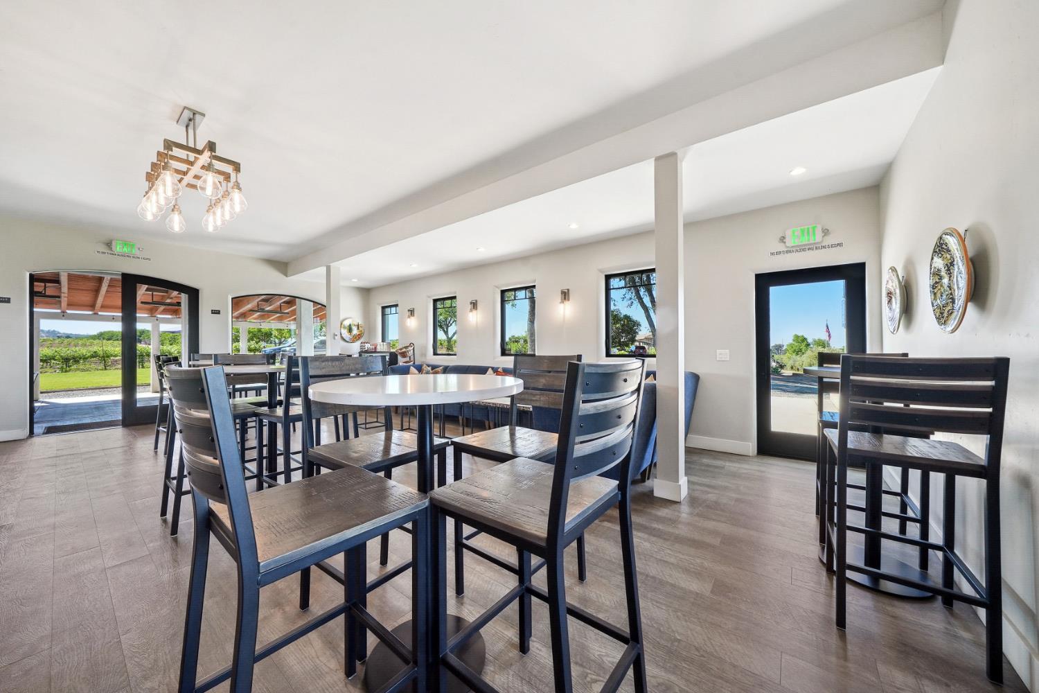 10786 Shenandoah Road Plymouth, CA 95669 - Photo 77 of 99 a view of a dining room with furniture window and wooden floor