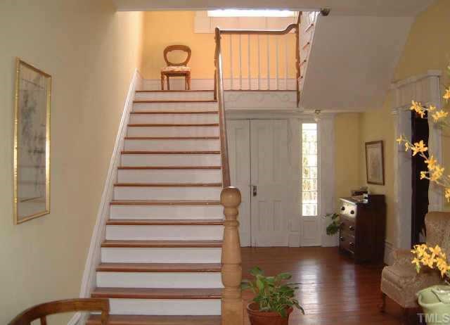 4840 Solomon Lea Road Leasburg, NC 27291 - Photo 3 of 10 a view of entryway and hall with wooden floor