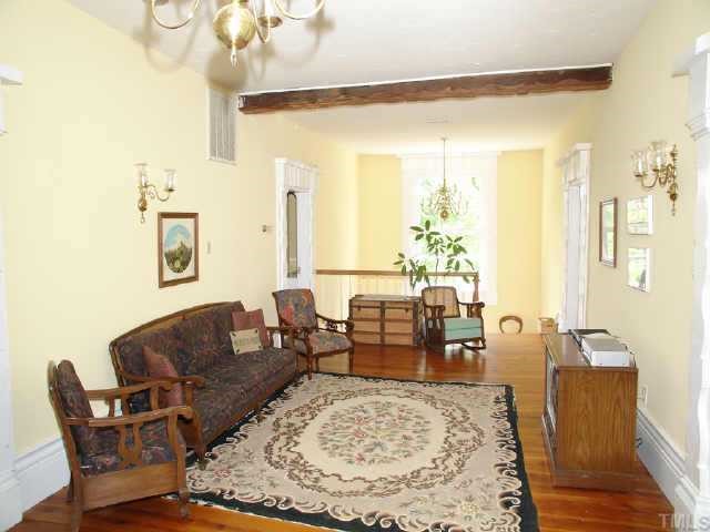 4840 Solomon Lea Road Leasburg, NC 27291 - Photo 7 of 10 a living room with furniture and a large window