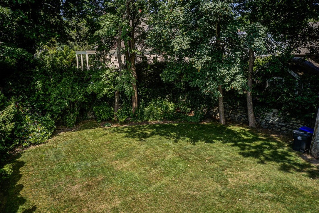 833 Main Street Warren, RI 02885 - Photo 39 of 47 Back yard Gardens along stonewall