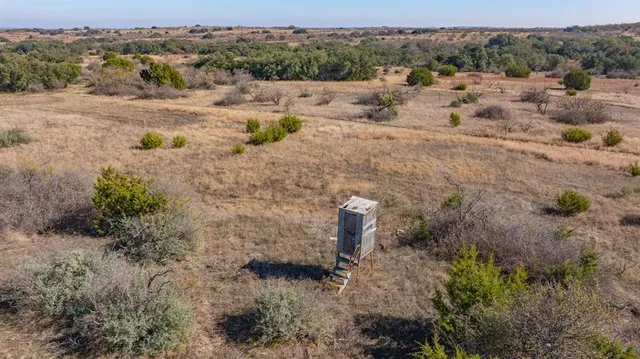 a view of a city with mountains in the background