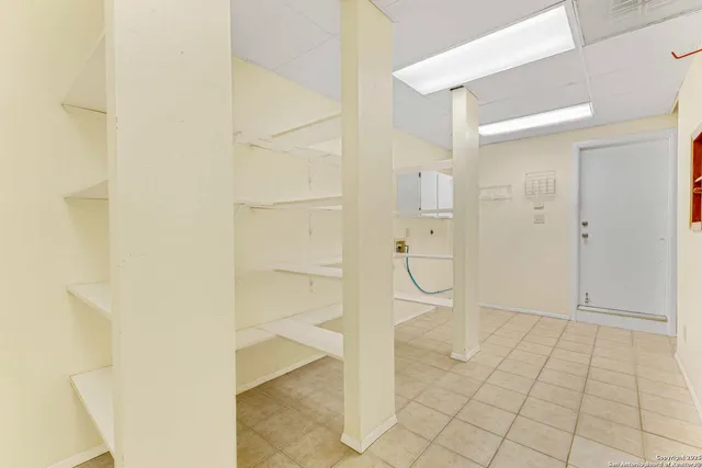 a living room with furniture or couch and a table