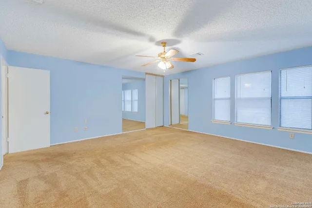 a view of a workspace with furniture