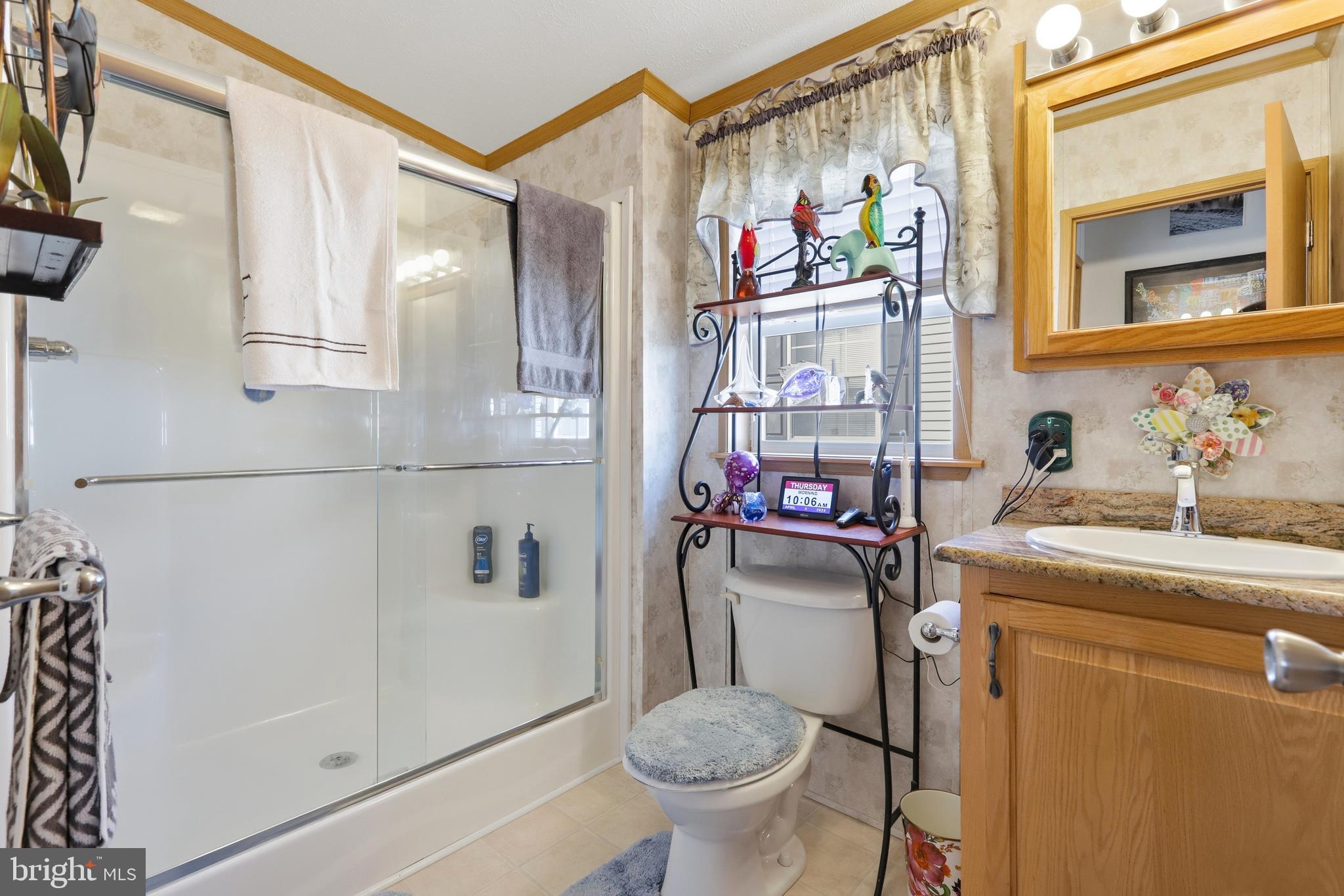 69 1st Avenue Media, PA 19063 - Photo 12 of 17 a bathroom with a toilet a sink and a shower