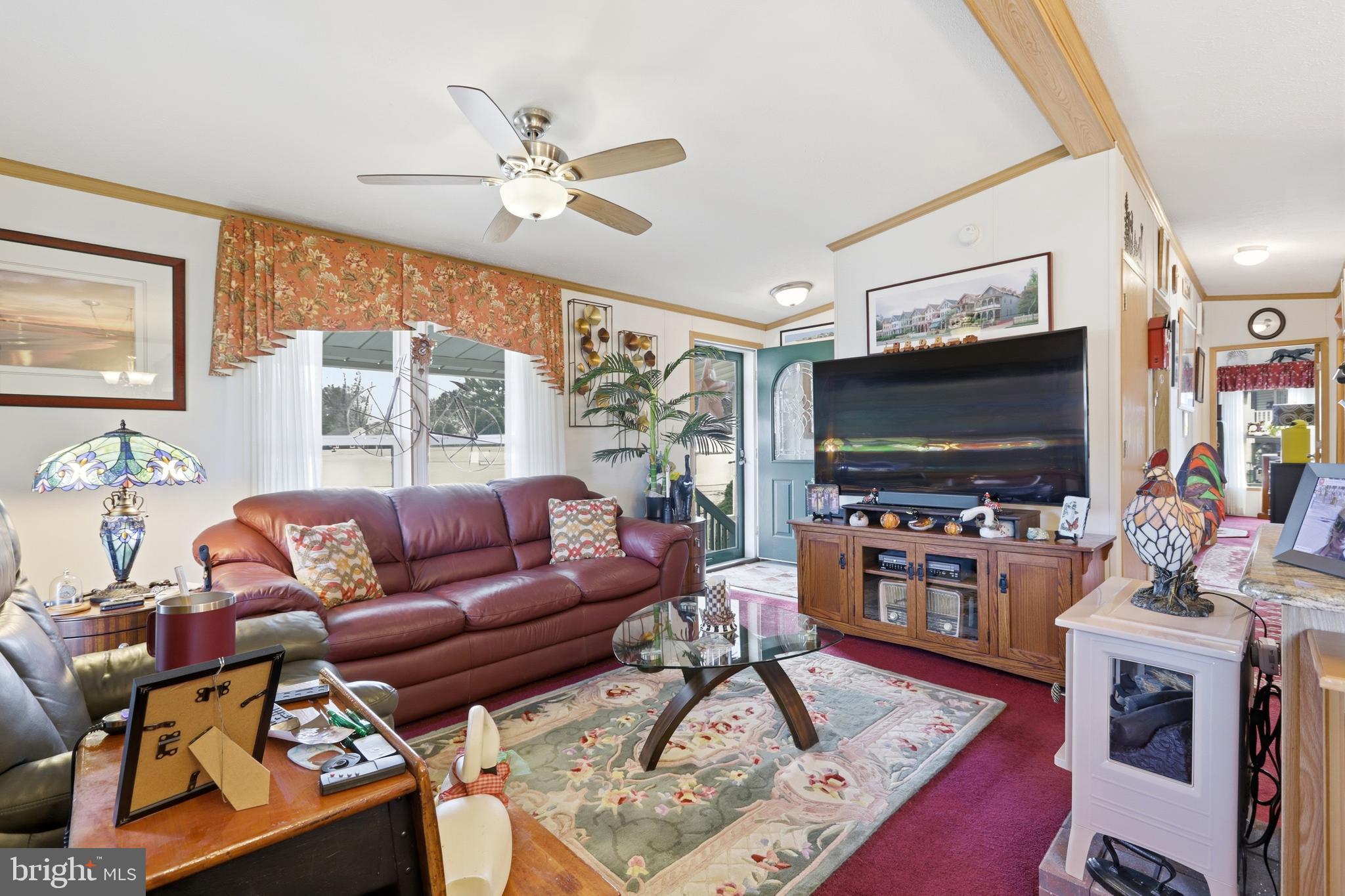 69 1st Avenue Media, PA 19063 - Photo 4 of 17 a living room with furniture and a flat screen tv