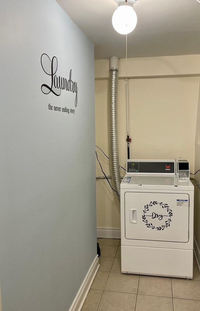 5616 South Indiana Avenue, Unit 2 Chicago, IL 60637 - Photo 13 of 14 a utility room with washer and dryer