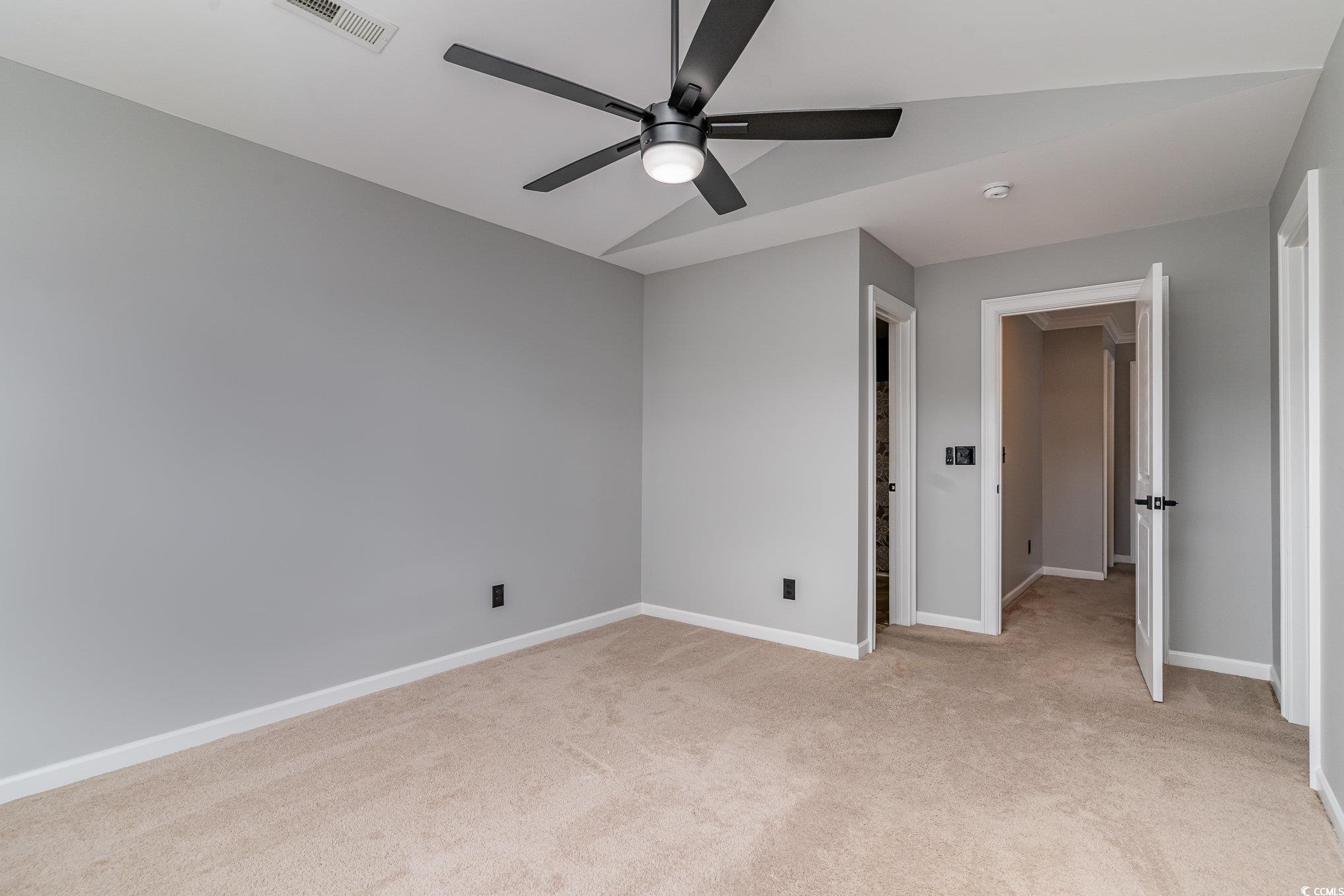 113 Winding Path Drive Loris, SC 29569 - Photo 23 of 36 Unfurnished bedroom featuring light carpet, baseboards, a ceiling fan, and visible vents