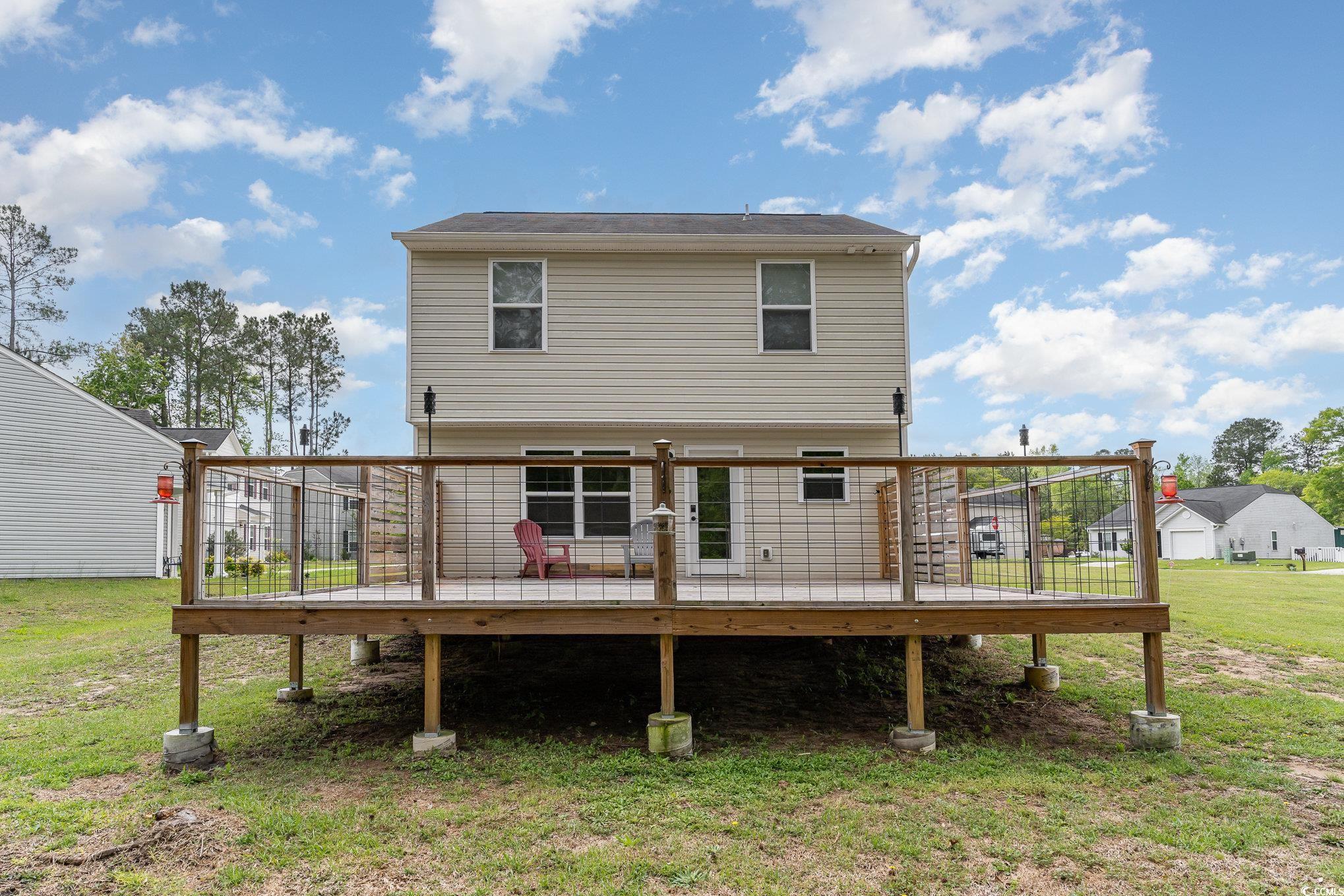 113 Winding Path Drive Loris, SC 29569 - Photo 34 of 36 Back of property featuring a yard and a deck