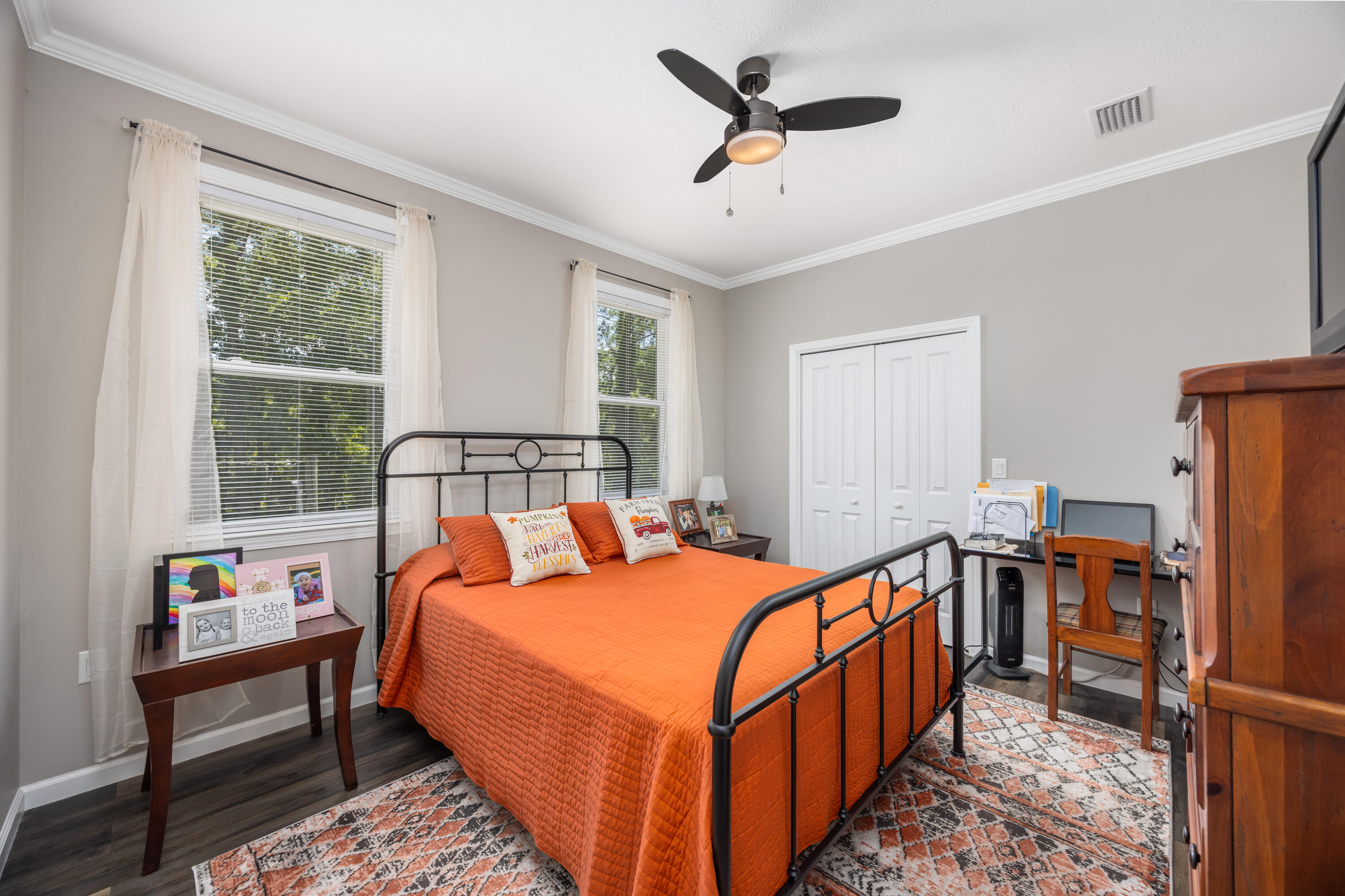 158 Johns Lane Freeport, FL 32439 - Photo 13 of 36 a bed room with a bed and a window