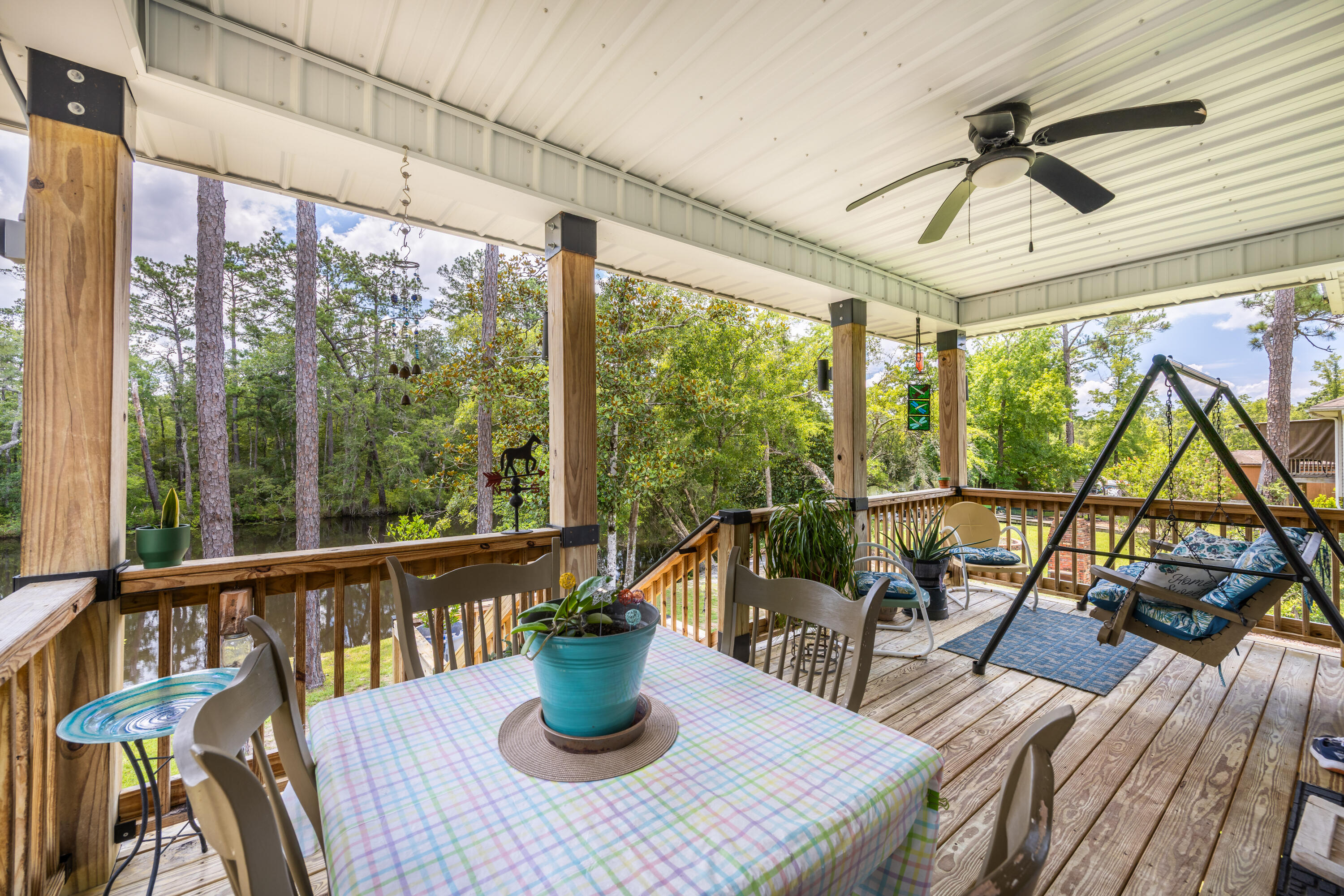 158 Johns Lane Freeport, FL 32439 - Photo 18 of 36 a view of a dining room with furniture window and outside view