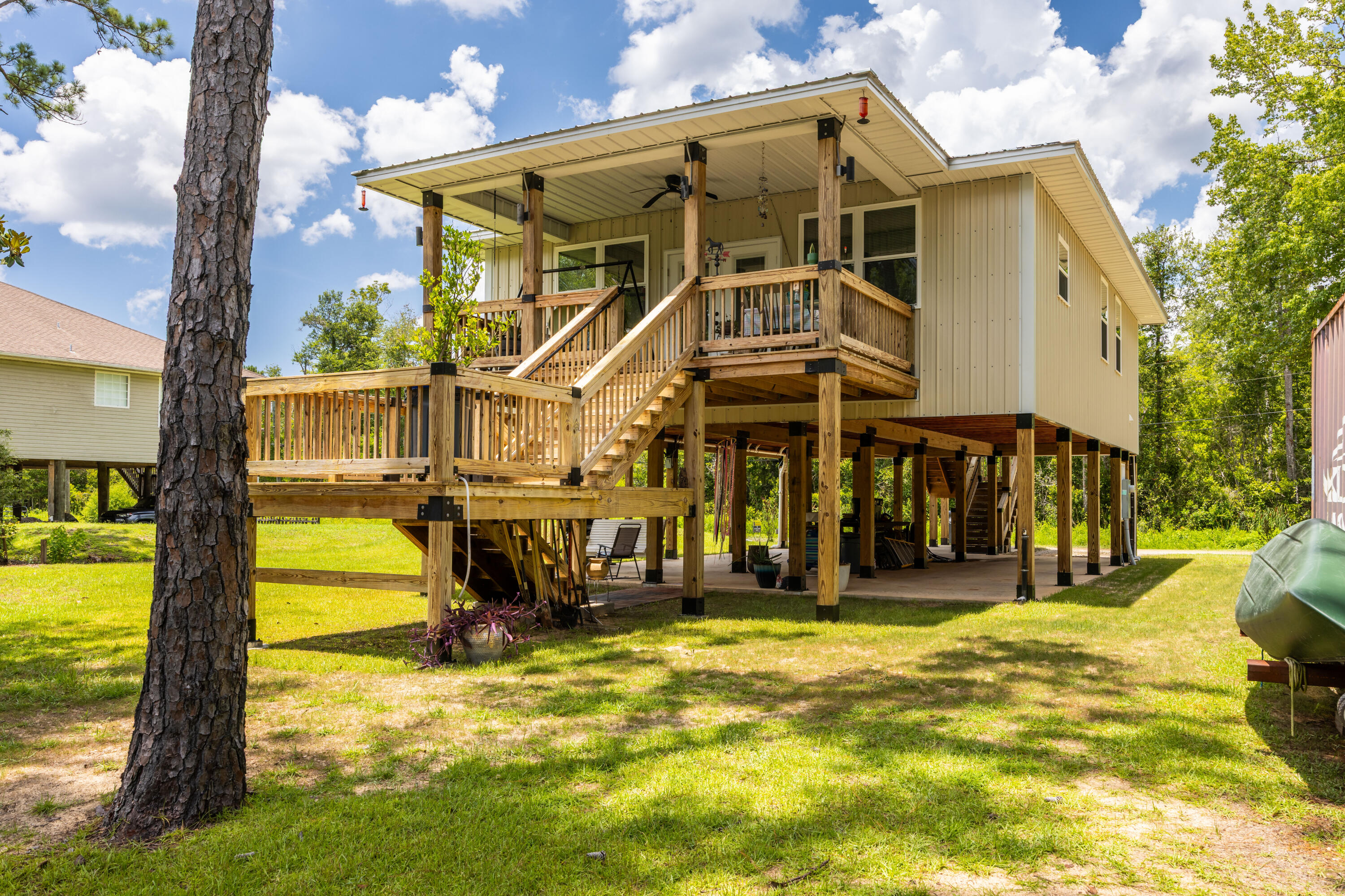 158 Johns Lane Freeport, FL 32439 - Photo 25 of 36 a view of a house with a swimming pool