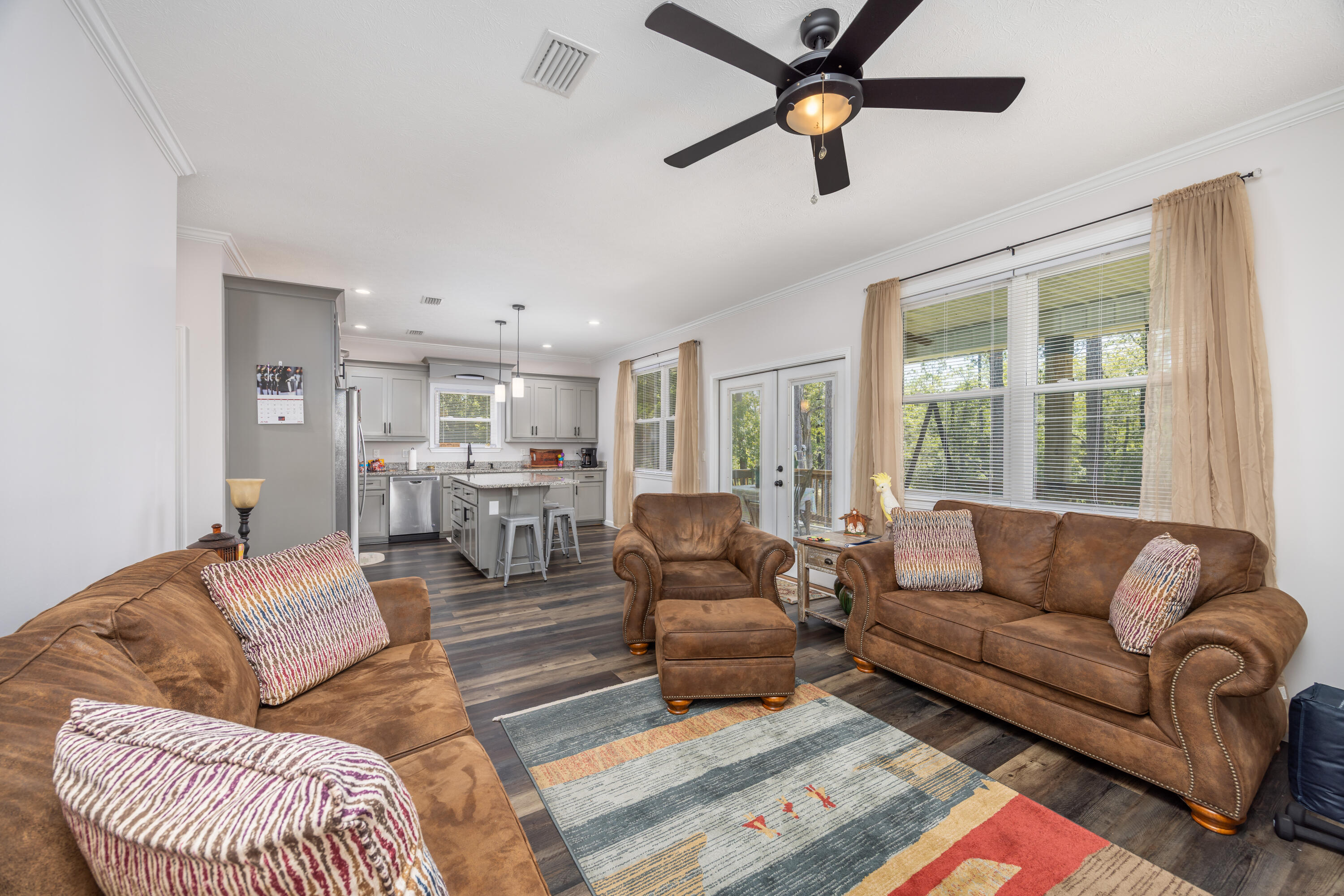 158 Johns Lane Freeport, FL 32439 - Photo 9 of 36 a living room with furniture and a window