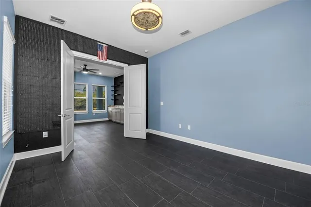 a view of balcony with wooden floor