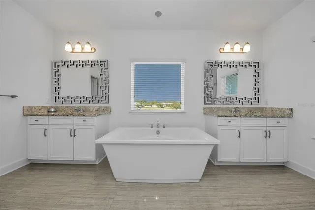 a view of a swimming pool with an outdoor seating