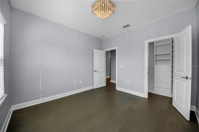 an outdoor view of a house with a porch