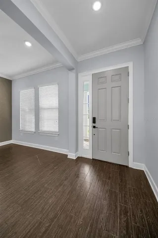 a kitchen with stainless steel appliances granite countertop a refrigerator a sink a stove a microwave and island