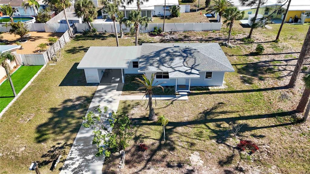 1075 Falcon Road Venice, FL 34293 - Photo 1 of 1 a view of a swimming pool with a patio