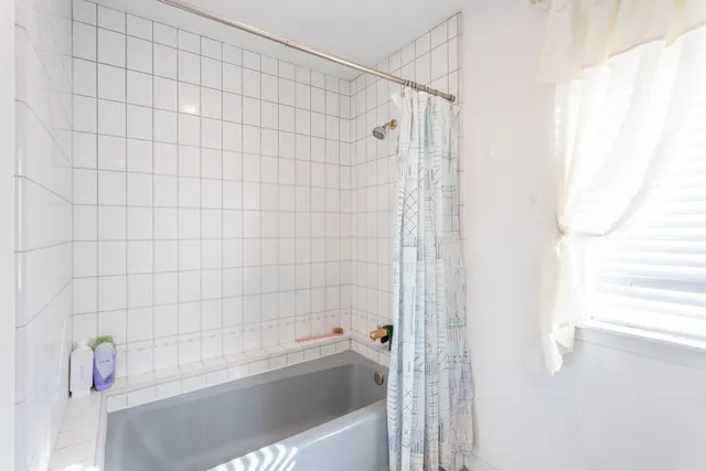 a bathroom with a sink a mirror and a vanity