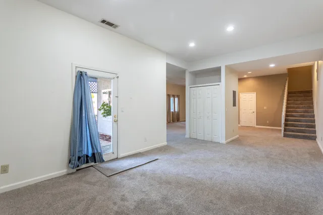 a front view of a house with yard