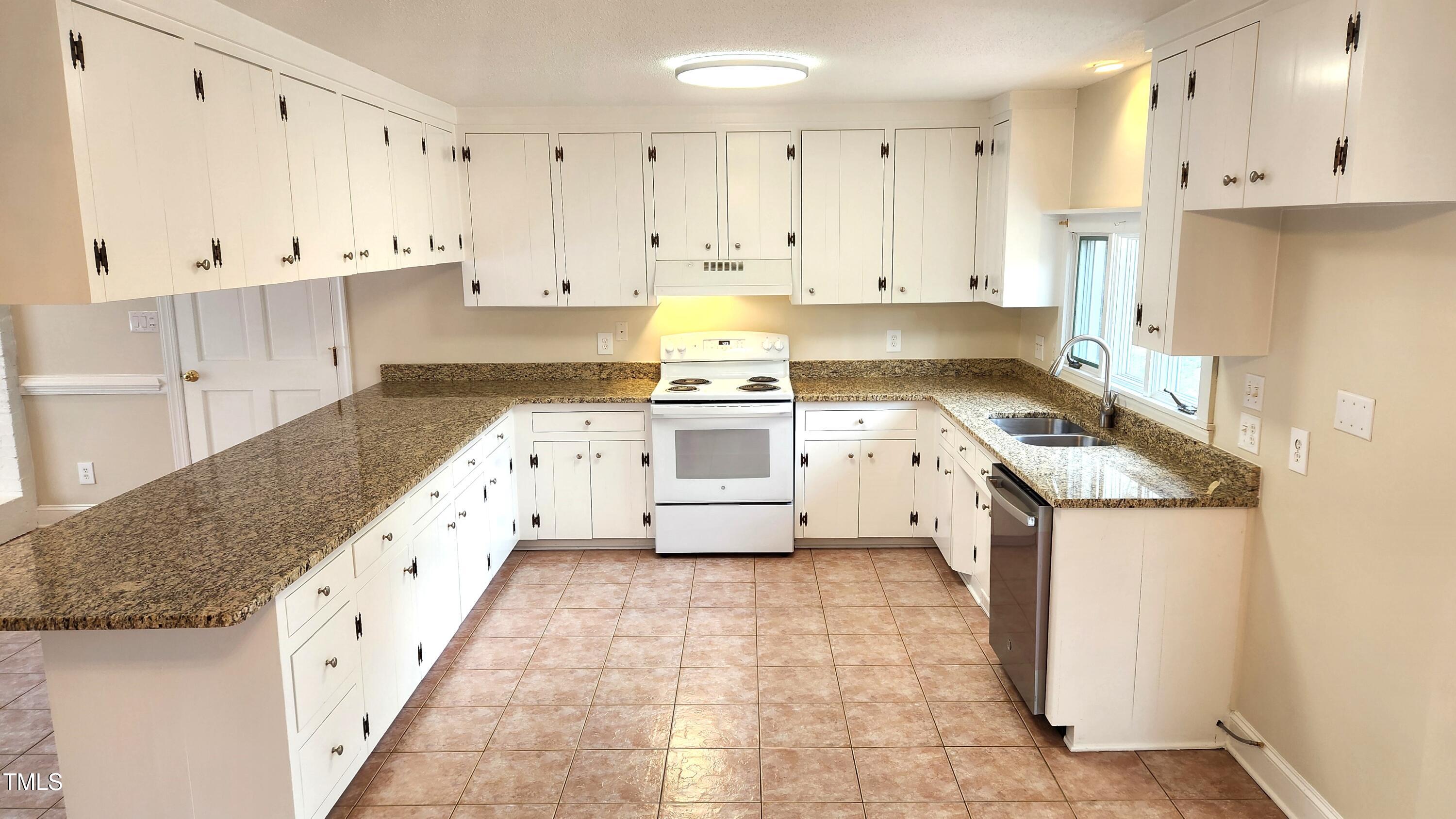 2704 Pidgeon Hill Road Raleigh, NC 27613 - Photo 6 of 12 Open Kitchen