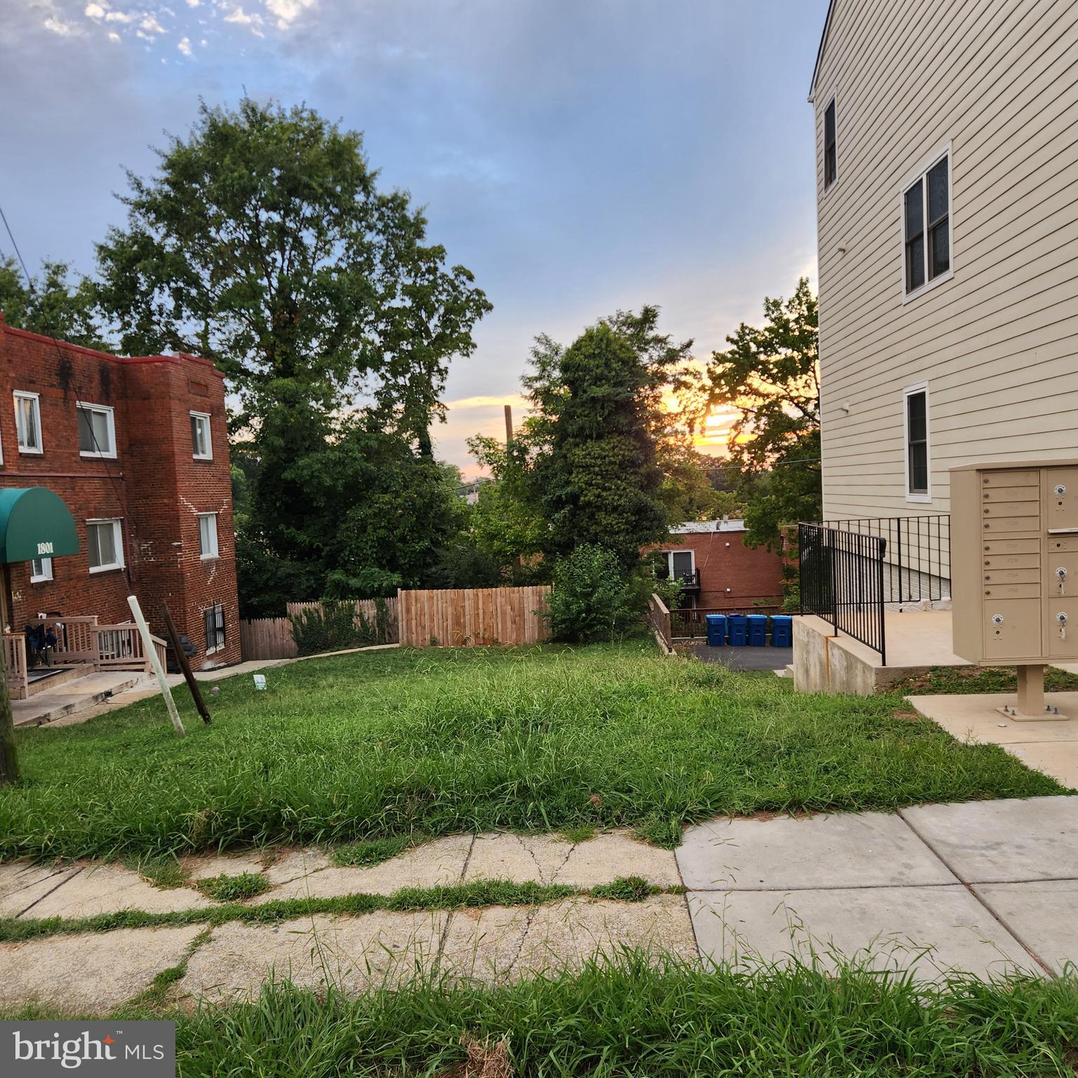 T Place Southeast Washington, DC 20020 - Photo 2 of 5 a view of backyard with barbeque grill and stairs