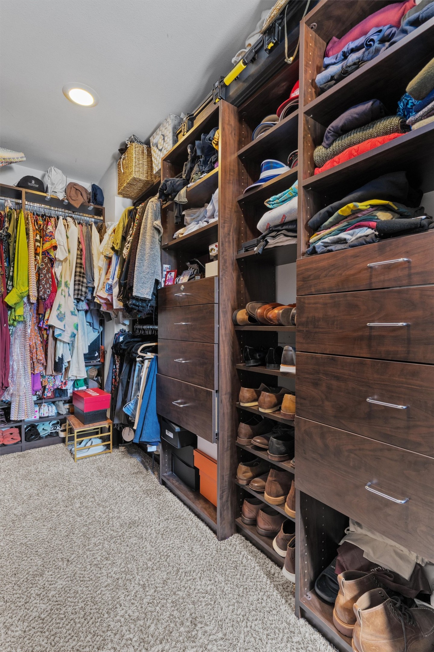1309 Fort Branch Boulevard Austin, TX 78721 - Photo 11 of 19 a view of walk in closet with clothes and shoes
