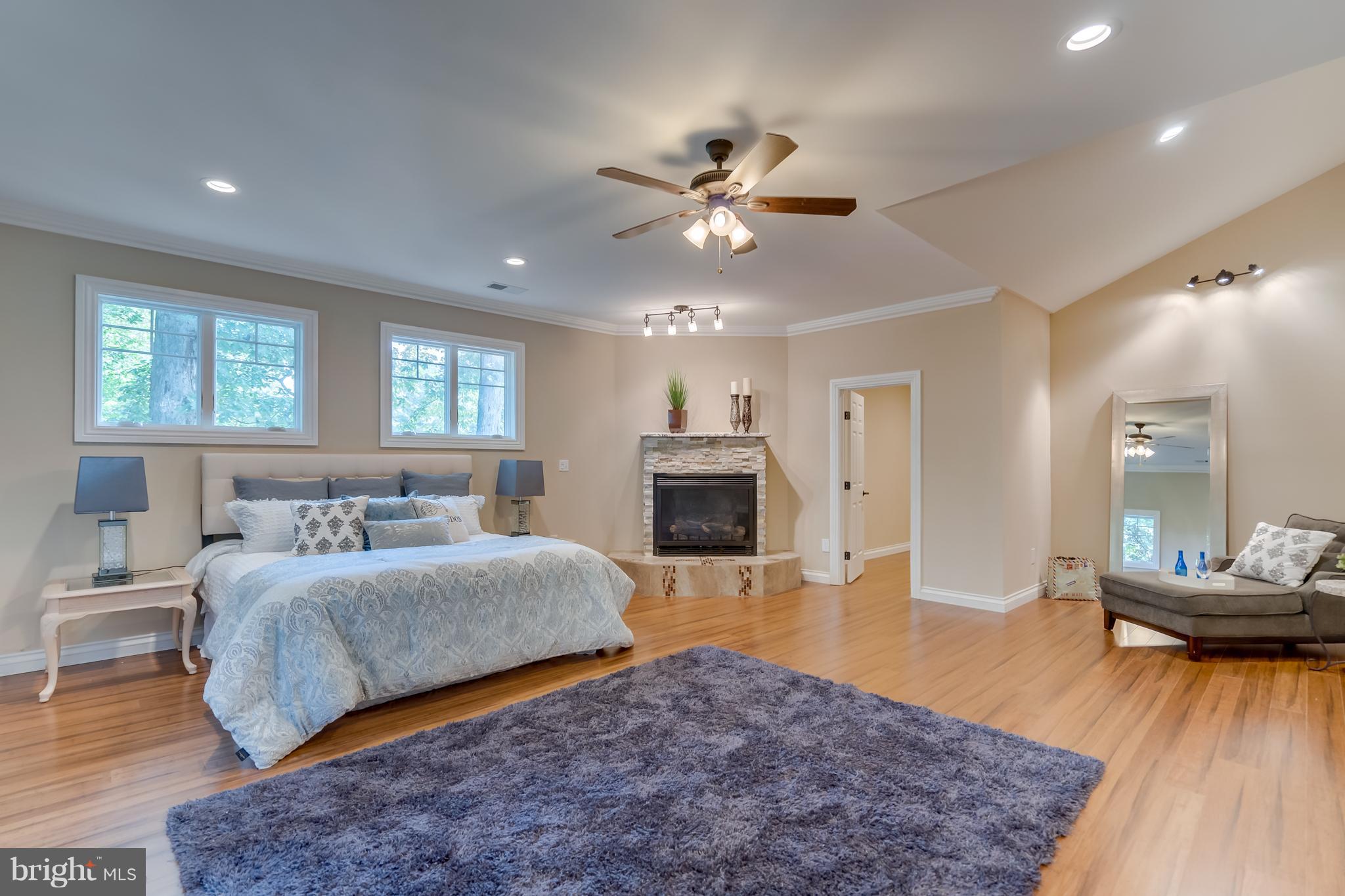 1415 Julia Avenue McLean, VA 22101 - Photo 18 of 30 a bedroom with a large bed and a wooden floor